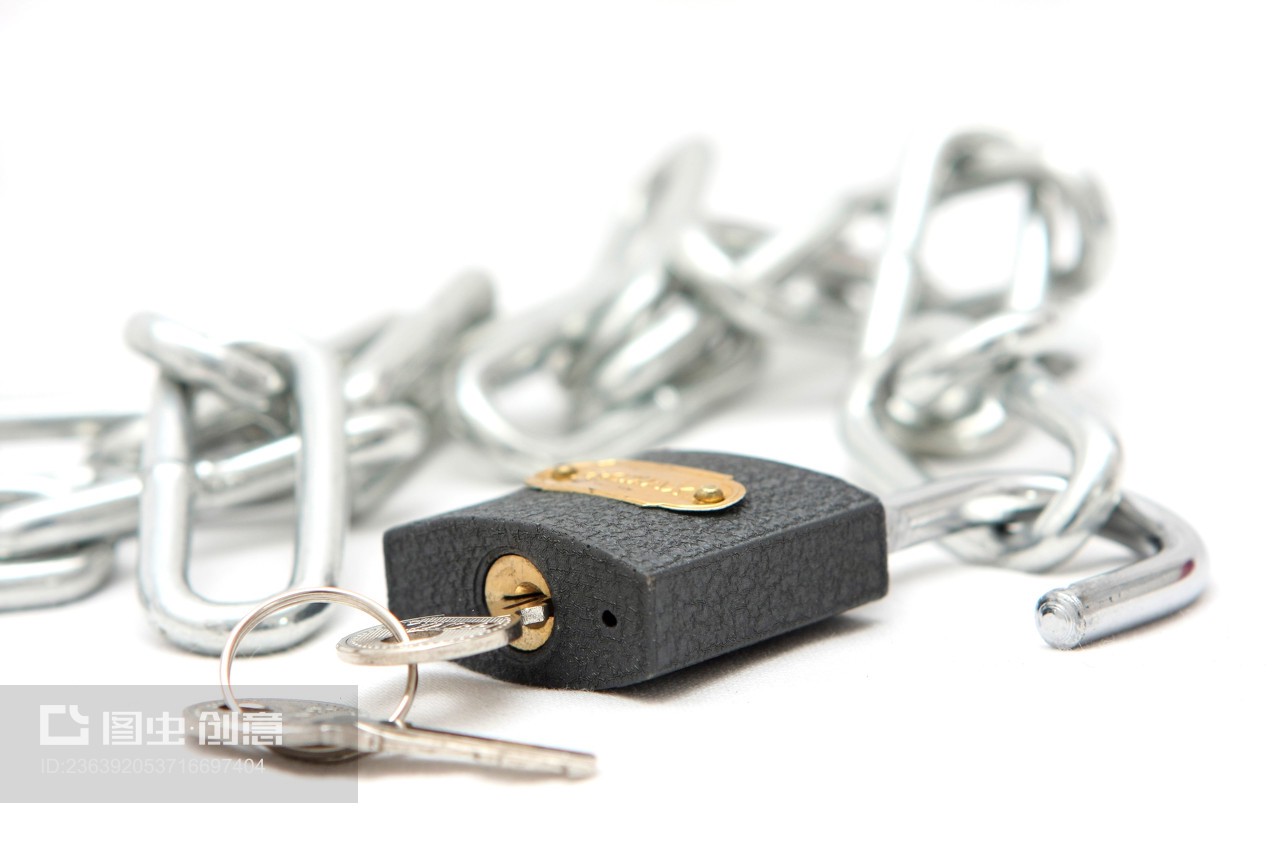 Cutout of a Lock, Key and chain on white background